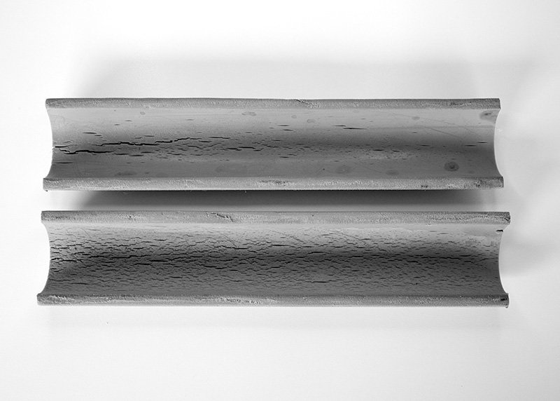 PP-R Degradation Cross Cut - Pipe2 Cross section of PP-R pipe, showing the degradation of the pipe on the inside where cracks have appeared.